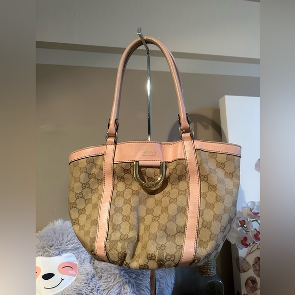 Gucci Handbags - 🥳HP🥳 Gucci GG pink bubble gum and tan canvas small leather trim tote bag
